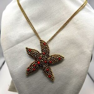 Gold tone Starfish pendant with faux diamonds and coral on a double strand chain